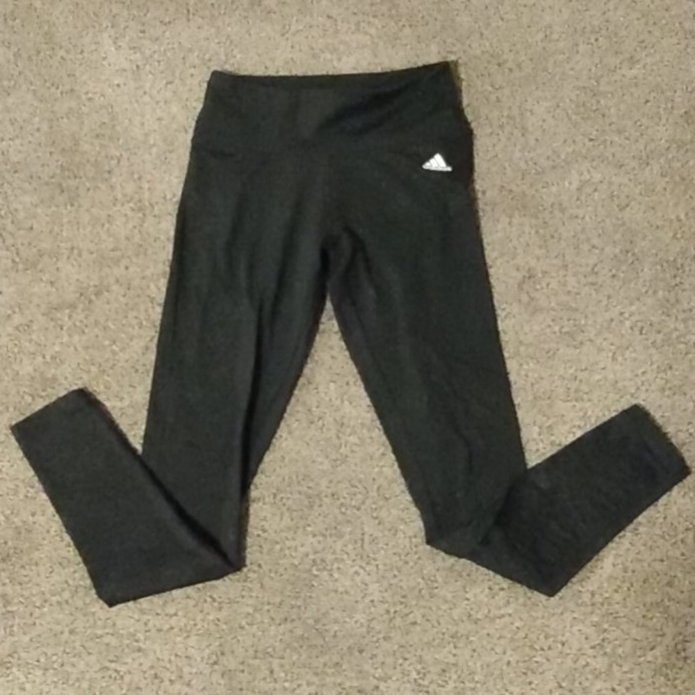 Adidas's black flower print leggings with zipper